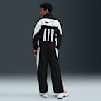 Spodnie dresowe z tkaniny dla dużych dzieci Nike Air