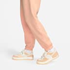 Pants de entrenamiento oversized de tiro alto para mujer Nike Sportswear Phoenix Fleece