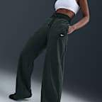 Pants de tejido Fleece cálidos de piernas anchas y tiro alto para mujer Nike Sportswear Phoenix Plush