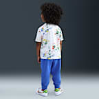 Conjunto de playera y pants Reveal estampado infantil Nike Sportswear