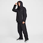 Pánské volné tkané kalhoty Nike Tech