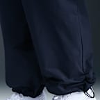 Pants cargo de tiro medio para mujer Nike Sportswear Everything Wovens