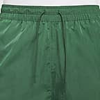 กางเกงขายาวเอวสูงเปิดชายแบบทอผู้หญิง Nike Windrunner