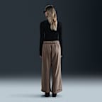 Pants de French Terry de tiro medio oversized con dobladillo abierto para mujer Nike Sportswear