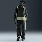 Pánské volnější tkané kalhoty Nike Tech Dri-FIT s barevnými díly