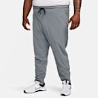 Pantalon avec ouvertures à zip Nike Dri-FIT Unlimited pour homme