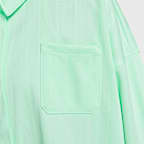 เสื้อเชิ้ตติดกระดุมลายทางผ้าแจ็คการ์ดโอเวอร์ไซส์ผู้หญิง Nike Sportswear