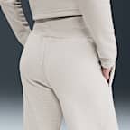 Pants de tejido Fleece cálidos de piernas anchas y tiro alto para mujer Nike Sportswear Phoenix Plush