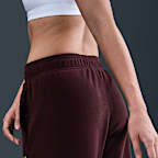 Pantaloni in fleece a vita media Therma-FIT Nike One – Donna