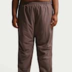 Pants de tejido Woven de tiro alto oversized para mujer Nike Sportswear (talla grande)