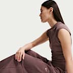 Pantalones entubados de tiro medio holgados para mujer Nike Sportswear Phoenix Fleece