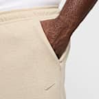 Shorts de alto rendimiento Dri-FIT de 18 cm sin forro con protección UV para hombre Nike Primary Fleece