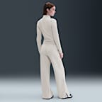 Pants de tejido Fleece cálidos de piernas anchas y tiro alto para mujer Nike Sportswear Phoenix Plush