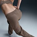 Nike Sportswear Everything Wovens középmagas szabású, nyitott szegélyű női nadrág