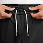 Nike Windrunner Geweven herenbroek met voering