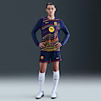 Maglia da calcio a girocollo pre-partita Nike Dri-FIT FC Barcelona Strike da donna – Home