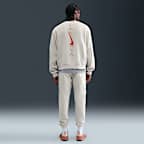 Pants de tejido Fleece con puños para hombre Nike Sportswear Club