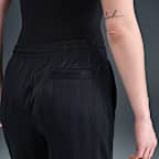 Pants deportivos de jacquard a rayas de tiro medio holgados para mujer Nike Sportswear