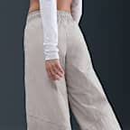 Pants de tejido Woven de pierna ancha para mujer Nike Sportswear