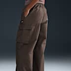 Pants cargo de tiro medio para mujer Nike Sportswear Everything Wovens