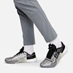 Pants versátiles Dri-FIT de pierna entallada para hombre Nike Unlimited