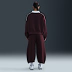 Pantalones entubados de tiro medio holgados para mujer Nike Sportswear Phoenix Fleece