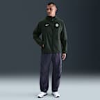 Chelsea FC Tech Windrunner Men's Nike Soccer Woven Full-Zip Jacket
