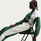 Γυναικείο παντελόνι φόρμας μεσαίου καβάλου σε φαρδιά γραμμή Nike Sportswear