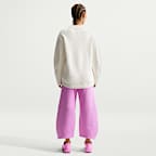 Pantalones entubados de tiro medio holgados para mujer Nike Sportswear Phoenix Fleece