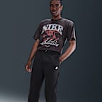 Ανδρικό υφαντό παντελόνι που στενεύει προς τα κάτω Nike Club