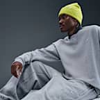 Fleecebyxor med muddar Nike Solo Swoosh för män