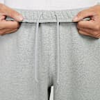 ナイキ ソロ スウッシュ メンズ フリース オープンヘム パンツ