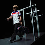 Inglaterra Essential Windrunner Chaqueta de fútbol de tejido Woven Nike - Mujer