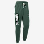 Pants Nike Dri-FIT de la NFL de pierna entallada para hombre Green Bay Packers Ground Game Sideline - Verde