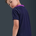 FC Barcelona Strike Nike Dri-FIT rövid ujjú futballfelső nagyobb gyerekeknek