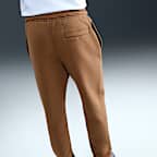 Pants de tejido Fleece con puños para hombre Nike Sportswear Club