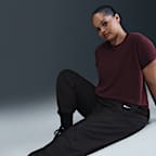 Joggers de tiro medio holgados con protección contra los rayos UV para mujer Nike Sportswear Classic Wovens (Talla grande)