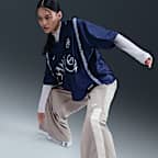 Pants de tejido Woven de pierna ancha para mujer Nike Sportswear