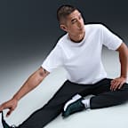 Pants Dri-FIT versátiles con dobladillo abierto para hombre Nike Totality