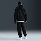 Pants de básquetbol con puños de tejido Fleece Nike Caitlin Clark