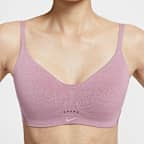 สปอร์ตบราผู้หญิงซัพพอร์ตระดับต่ำเสริมฟองน้ำดีไซน์ปรับเปลี่ยนได้ Nike Alate Minimalist