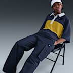 Pants cargo de tiro medio para mujer Nike Sportswear Everything Wovens
