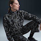 Chamarra de tejido Woven estampada y holgada de cierre completo y protección contra los rayos UV para mujer Nike Sportswear Windrunner