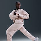 Pants de tejido Fleece Therma-FIT de tiro medio para mujer Nike One