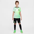 Předzápasové fotbalové tričko Nike Dri-FIT Austrálie Academy Pro pro větší děti s krátkým rukávem