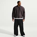 Pants de tejido Fleece de ajuste holgado con dobladillo abierto para hombre Nike Tech