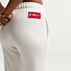 Pants de fútbol Nike de tiro medio para mujer USMNT Club Fleece