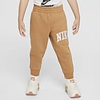 Pants de tejido Fleece con apliques infantil Nike Sportswear Club  - Lino