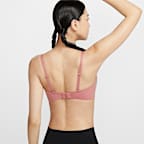 สปอร์ตบราผู้หญิงซัพพอร์ตระดับต่ำเสริมฟองน้ำดีไซน์ปรับเปลี่ยนได้ Nike Alate Minimalist