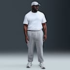 Pánské kalhoty Nike Club z česaného flísu s manžetami